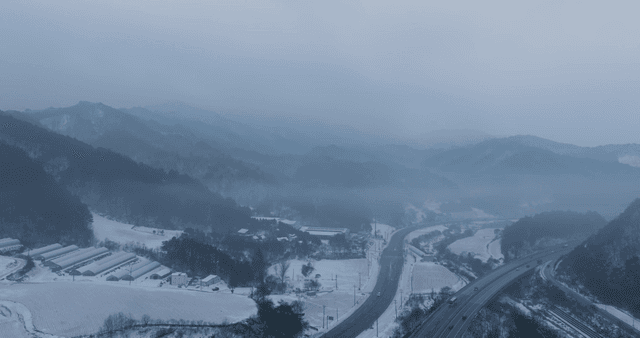 Snowy mountains and winding roads
