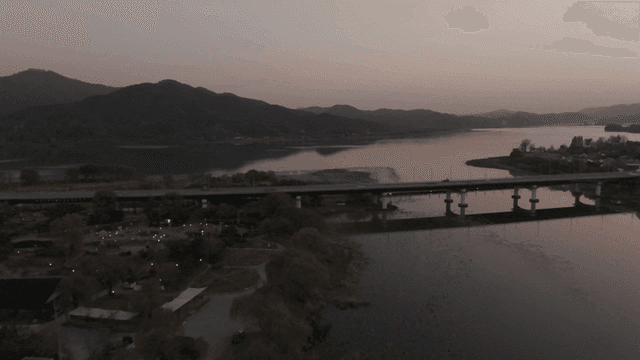 Quiet river and bridge in evening