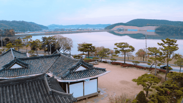 Traditional Korean house by a serene lake