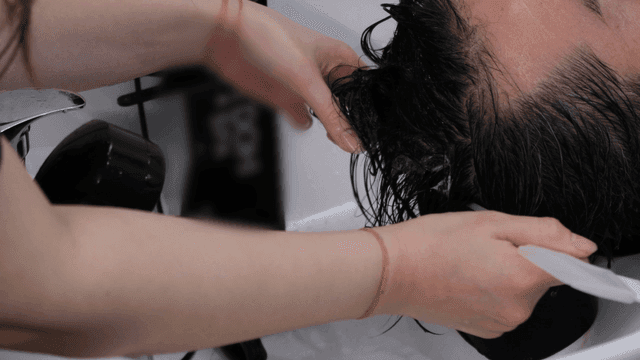 Hair washing and scalp care at beauty salon
