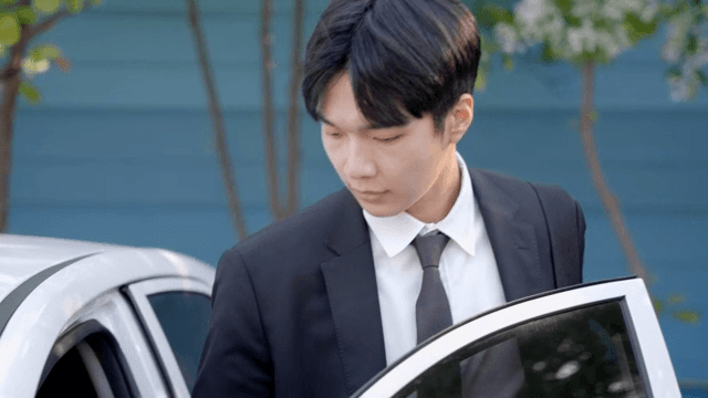Office worker male riding in car