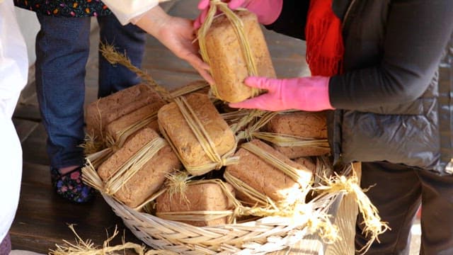 People Organizing Fermented Soybean Lump