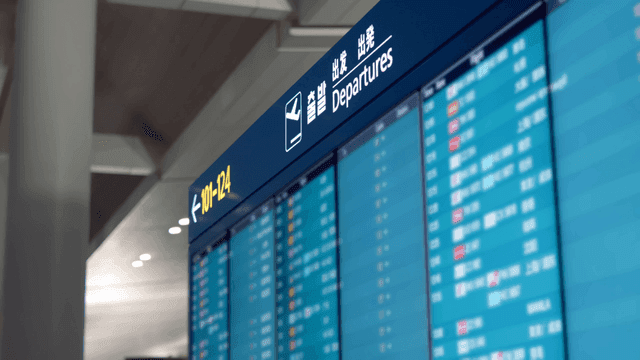 Departure board at an airport terminal