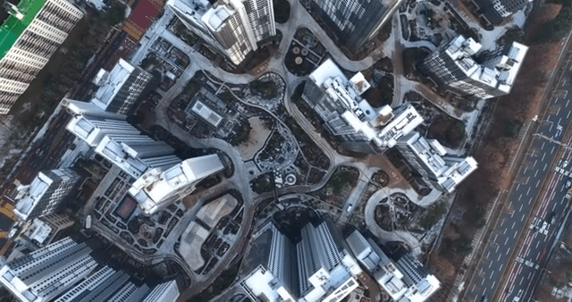 Snow-covered high-rise apartment landscape