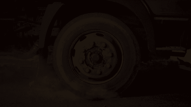 Rusty car wheels in dark