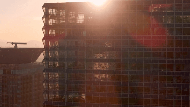 Sunset reflecting on modern skyscraper