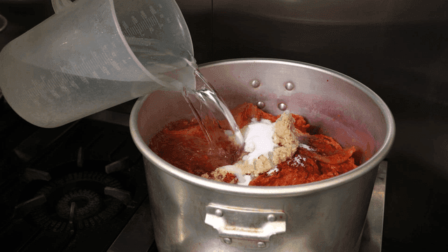 Clear broth poured over kimchi stew