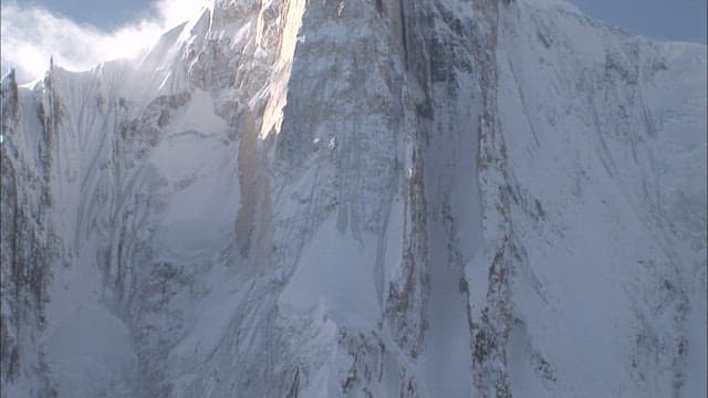 Majestic Snow-Covered Mountain Peaks