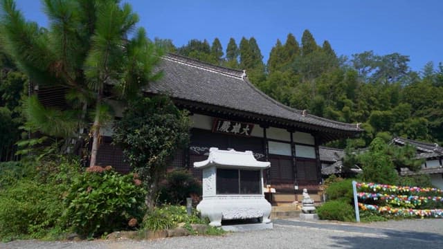 Serene Traditional Japanese Temple with Lush Greenery