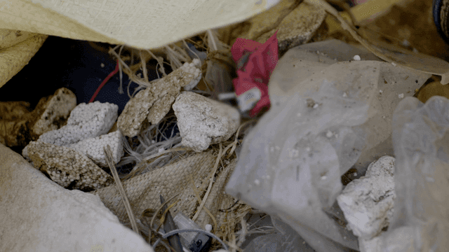 Close-up shots of various trash and debris