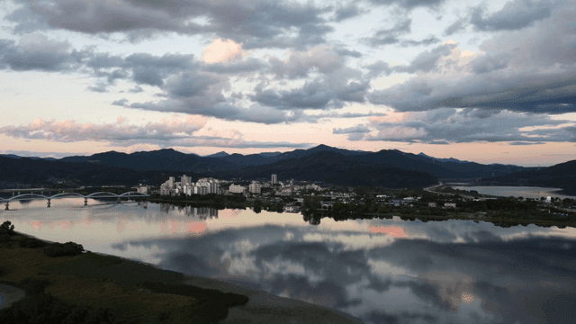 Cityscape with mountains and rivers