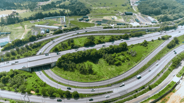 Aerial view of a highway with greenery