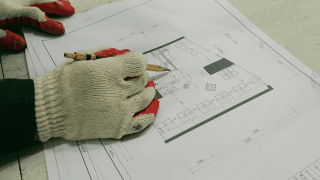 Architectural drawings verified by worker