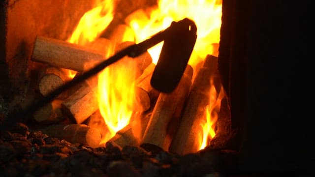 Firewood burning in a fireplace