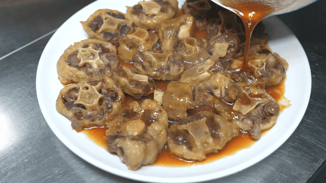 Braised oxtail on plate