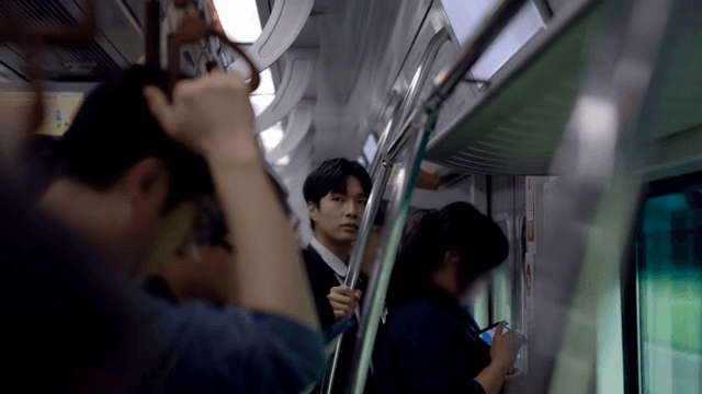Office worker male in crowded subway