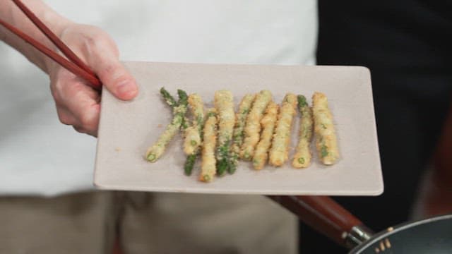 Preparing Fried Asparagus in a Kitchen