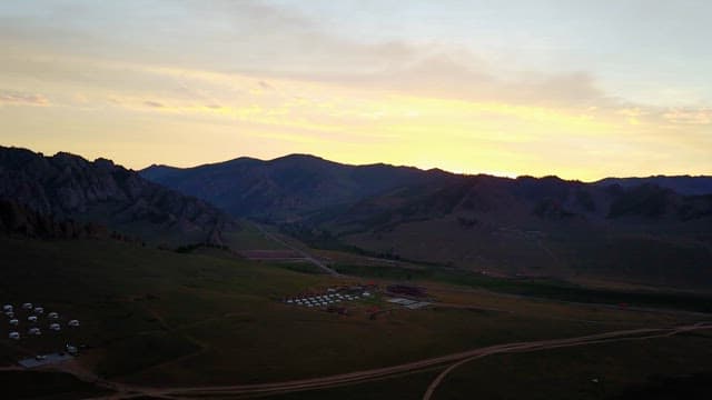 Sunset over a mountainous landscape