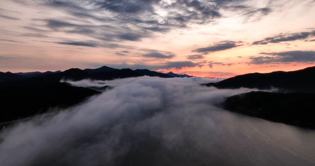 Mountains and clouds at sunrise