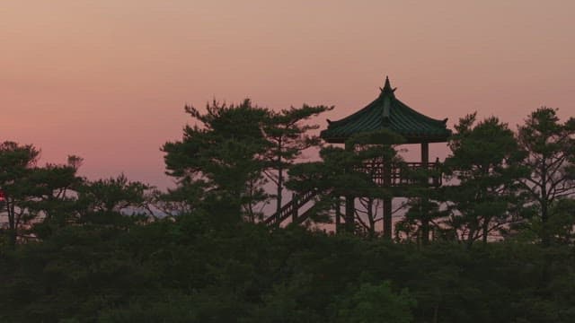 Sunset view with an old pavilion