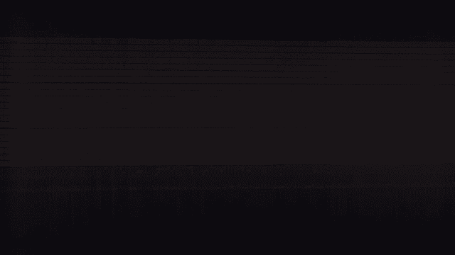 Inside a dimly lit tunnel with lined walls