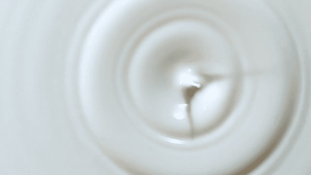 Milk droplet creating ripples