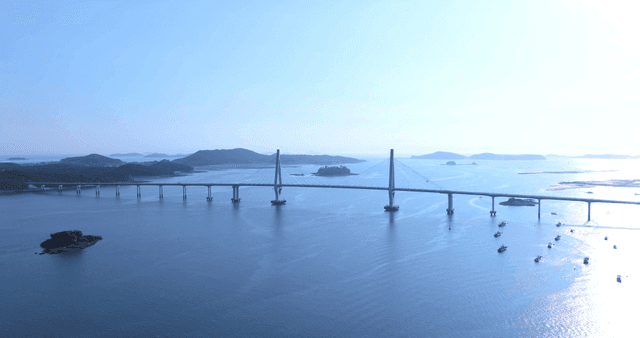 Bridge crossing calm sea