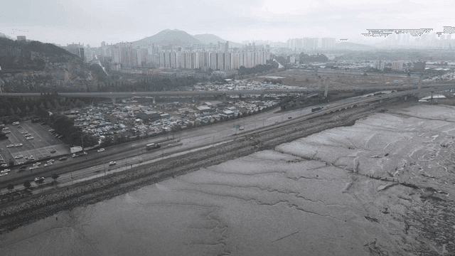 Cityscape with mountains and roads