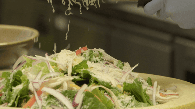 Fresh salad sprinkled with cheese