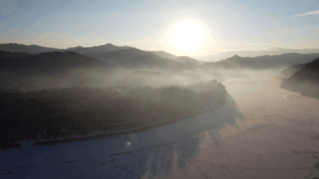 Tranquil river scene at sunrise
