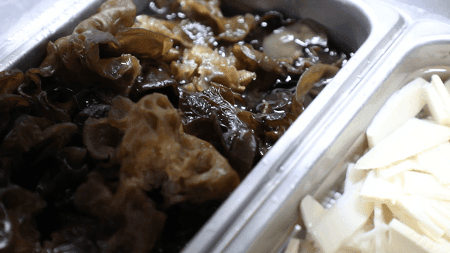 Mushrooms and bamboo shoots in a tray