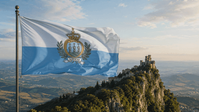Sight of San Marino flag waving on mountain and castle