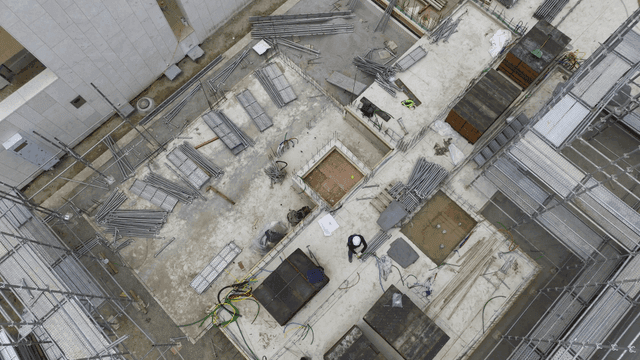 Construction site with scaffolding and workers