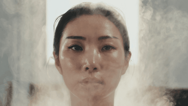 Woman who enjoys facial steam care