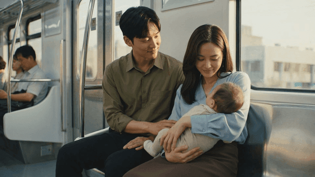 Couple with baby on subway