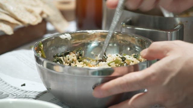 Eating Korean Thistle and Rice Mixed in a Spoon