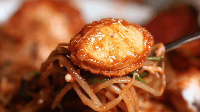 Abalone and bean sprout seafood stew served on spoon