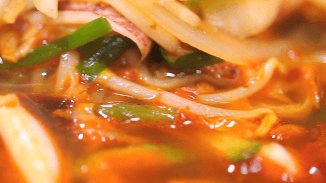 Spicy seafood noodle soup with vegetables and seafood