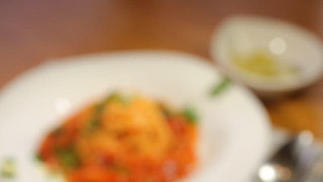 Plate of spaghetti with tomato sauce