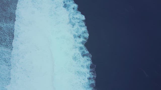 Waves crashing on the ocean surface