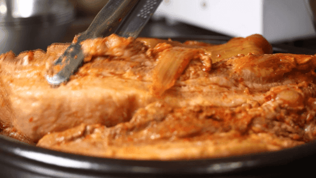 Kimchi stew with thick pork belly in pot