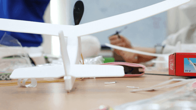 Model airplane assembly on a desk