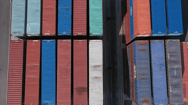 Stacked shipping containers at a port