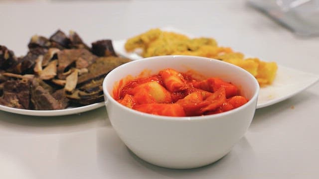 Fried Dumplings Dipped in Tteokbokki Sauce