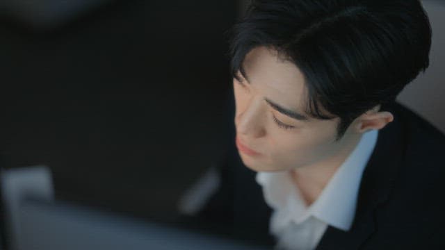 Focused man working at a desk