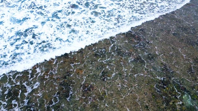 Waves Crashing onto Rocky Shore