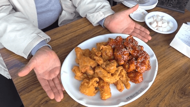 A plate of fried and spicy Korean chicken