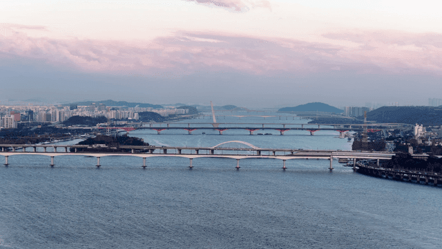 Cityscape with several bridges over river