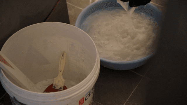 Plastering tools contained in a bucket