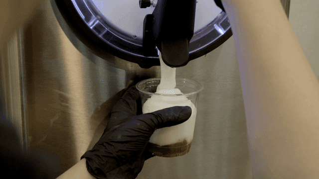 Soft serve ice cream being dispensed